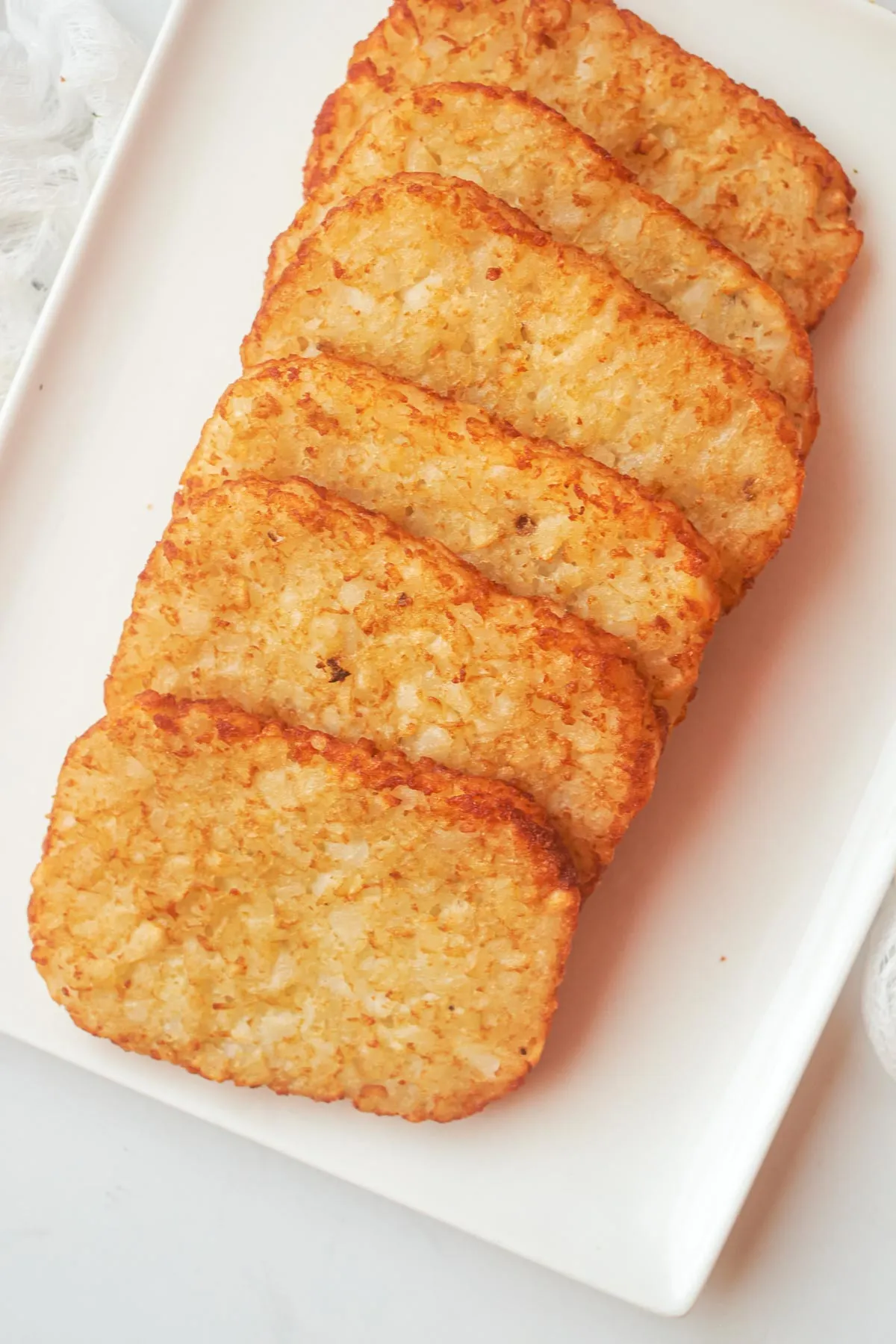 Golden crispy hash browns breakfast side at Fluff and Crunch breakfast restaurant Warman